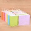 حقائب ورقية من أوراق ورقية موضوعة في أكياس هدايا مغلفة بالألوان وحقائب محمولة باليد مطبوعة حسب الطلب Specification image